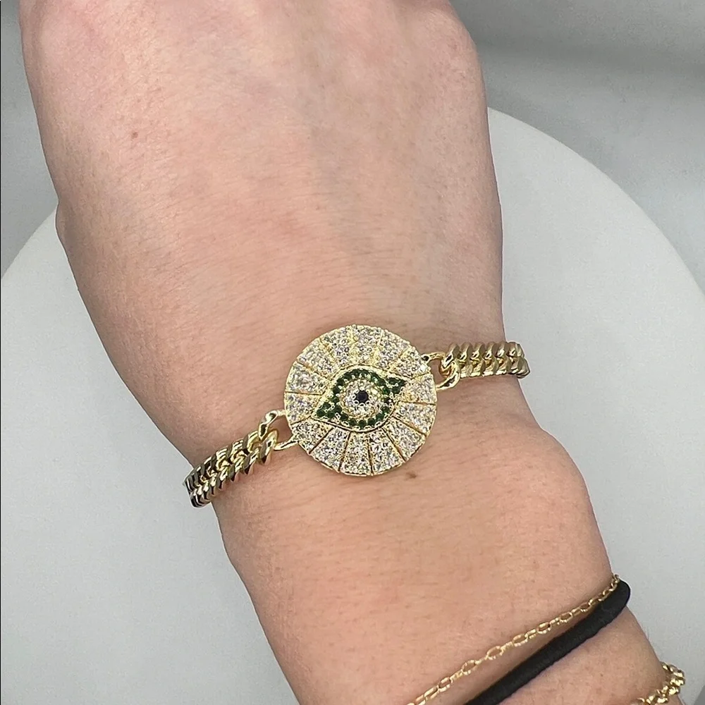 045. 18k Gold Plated Evil Eye Bracelet with green accents 7 1/4”